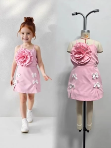 Pink girl's floral dress with 3D satin flowers and cute white bows on the skirt