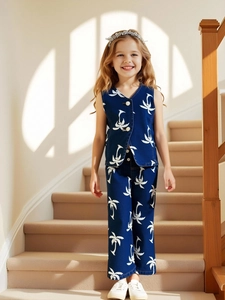 Kids fashion two-piece set featuring dark blue sleeveless vest and pants with palm tree prints