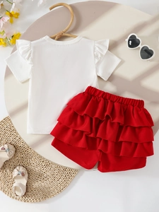 Girls summer outfit set featuring white flutter sleeve T-shirt and red tiered ruffle shorts