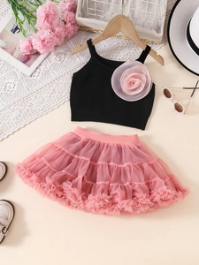 Girls sweet two-piece set featuring black knit vest with pink flower and tutu cake skirt