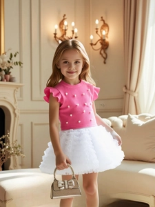 Girls pink ribbed knit top with pearls and white layered tutu skirt with gold bow bag