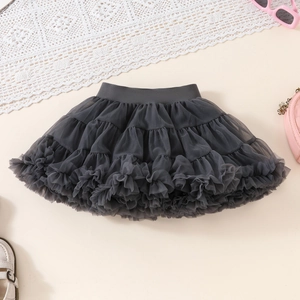 Close-up of dark grey tiered tulle tutu skirt with elastic waistband and mesh layers
