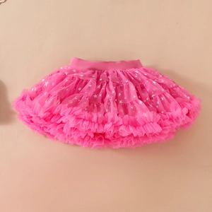 Detail of pink tutu skirt with silver star prints and elastic waistband for girls