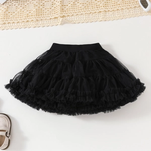 Detail of multi-layered black tutu skirt with dense mesh tiers and elastic waistband
