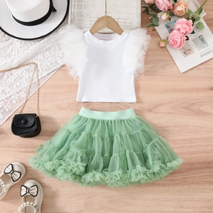 Detailed flat lay of toddler tutu set with ruffled sleeve top and sage green mesh skirt
