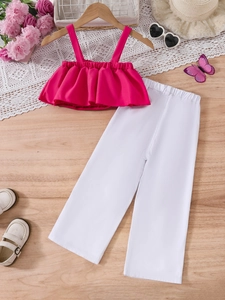 Girls summer fashion set with hot pink ruffle camisole and white wide-leg pants
