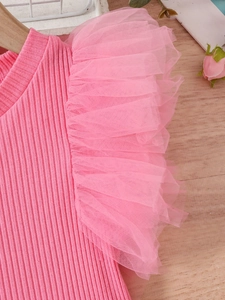 Pink knit top for girls featuring tiered mesh ruffle sleeves and soft ribbed fabric