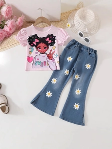 Flat lay detail of girls pink t-shirt and daisy print denim bell-bottom pants set