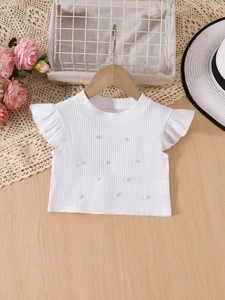 Haut blanc élégant en maille pour filles avec manches volantées et décorations de perles