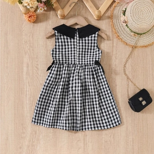 Robe vichy noir et blanc pour fille avec col Claudine et détails de nœuds élégants