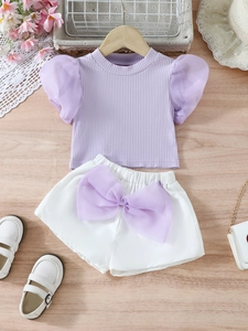 Girls summer set with purple puff sleeve rib knit top and white bow shorts outfit