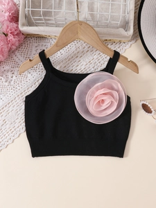 Schwarzes Strickoberteil für Mädchen mit großer rosa Blume im süßen französischen Stil