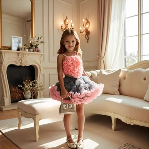 Detail of pink floral 3D rose camisole top and layered tulle tutu skirt for girls