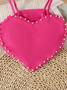 Rose pink heart-shaped princess dress with delicate white pearls along the neckline