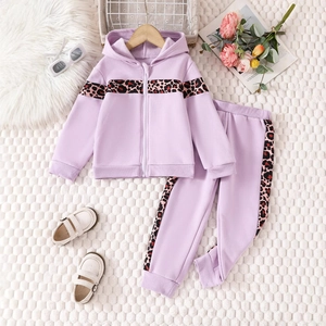 Close-up of kids purple hoodie set featuring leopard print patchwork and soft knit texture
