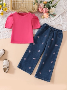Girl's pink puff sleeve T-shirt and blue denim jeans set with pink bow embroidery