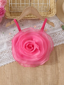 Ensemble fille avec haut à roses 3D roses et jupe en jean à étoiles sur cintre