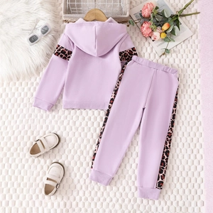Close-up of lavender hoodie and pants set featuring leopard print side panel detailing