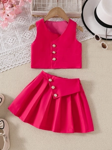 Mädchen-Set in Pink mit ärmelloser Weste und Faltenrock in stilvoller Flachbild-Optik