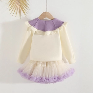 Detail of toddler knit sweater with purple lace collar and matching mesh tutu skirt