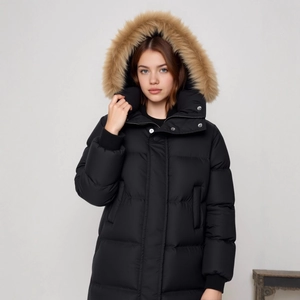 Close-up of black winter parka with faux fur hood and ribbed windproof cuffs