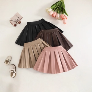 Jupes plissées en cuir PU pour filles en noir, marron, kaki et rose, vue à plat de dessus