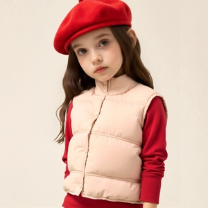 Close-up of pink padded kids vest featuring classic stand collar and snap button closure
