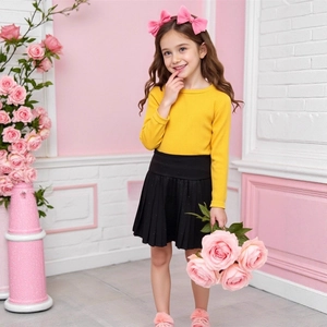 Girls' yellow long sleeve ribbed top and black pleated skirt two-piece clothing set