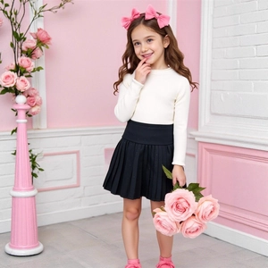 Girls long sleeve knit top and black pleated skirt two-piece set for autumn and winter