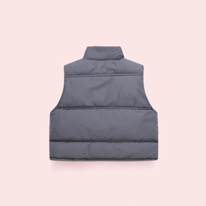 Back view of a thick dark grey quilted vest for children featuring a sleek stand collar