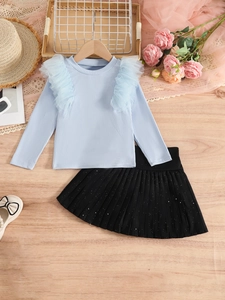 Girls sweet blue long sleeve ribbed top with mesh ruffles and black pleated skirt outfit