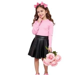 Girls pink ribbed knit long sleeve top and shiny black pleated skirt outfit set