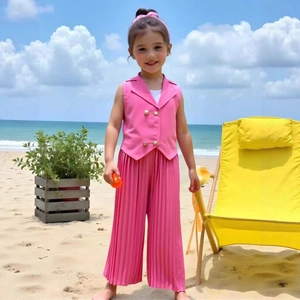 Detail of pink double-breasted vest and pleated wide-leg pants for girls summer outfit