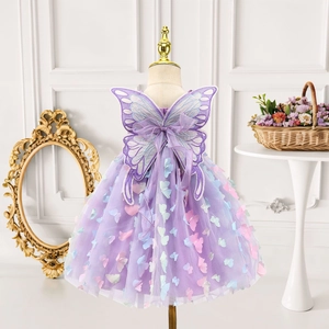 Detail of purple tulle girl dress with 3D butterflies and large wing decor on back