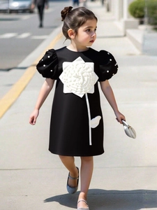 Elegant girls black puff sleeve dress with 3D white flower and pearl details
