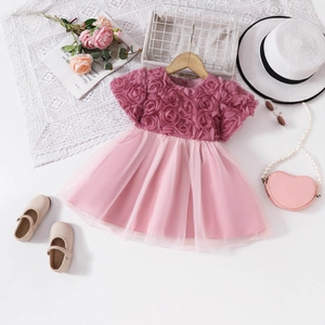 Close-up of pink tulle flower dress with 3D chiffon rose embroidery for girls