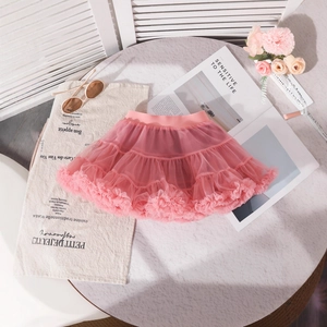 Detailed view of layered pink tutu skirt with soft mesh and elastic waistband