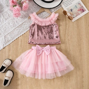 Flat lay of pink sequin sleeveless top and layered mesh tutu skirt for young girls