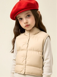 Kids quilted winter vest in beige with stand collar and round buttons for boys and girls