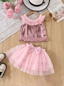 Girls pink sequin tank top and layered tulle cake skirt set with bow accessory