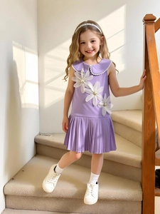 Girls purple sleeveless pleated dress with floral accents and a stylish doll collar
