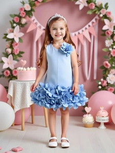 Light blue girls party dress with 3D fabric flowers and layered petal skirt details