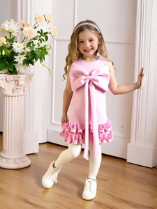 Pink sleeveless girls dress with large bow and ruffled hem for princess parties