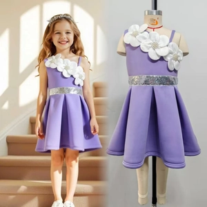 Detail of purple formal dress with white 3D flowers and silver sequin belt for girls