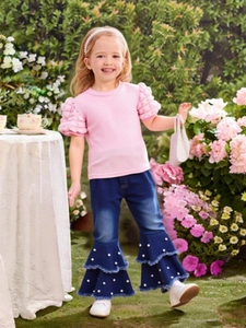 Girl's pink puff sleeve top and pearl-studded flare jeans two-piece outfit set