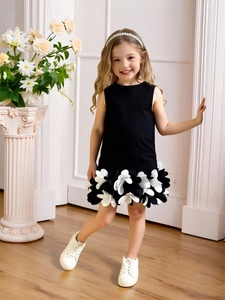 Elegant sleeveless black girls dress with 3D black and white floral petal skirt