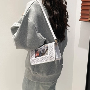 Street fashion newspaper print crossbody bag for women with golden hardware and shoulder strap