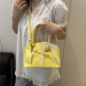 Yellow saddle bag with white lace bow and adjustable strap for women fashion