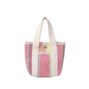 Colorful striped woven tote bag with canvas handles and silver snap closure