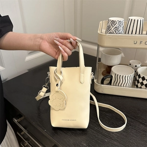 Women Minimalist PU Leather Small Crossbody Phone Bag Solid Color Mini Tote Handbag With Puppy Pendant Adjustable Strap